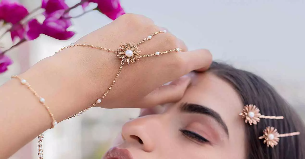 Girl in picture with hand fil of jewellery